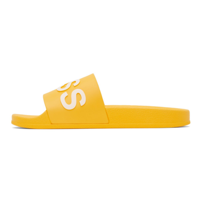 Shop Hugo Boss Yellow Bay Slides In 721 - Medium Yellow