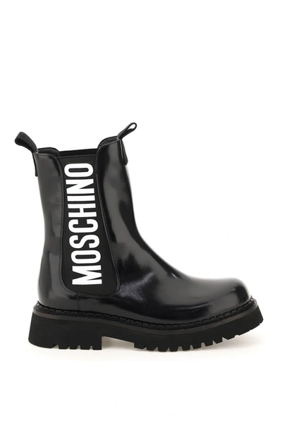 Shop Moschino Stivaletti Combat Con Logo In Nero