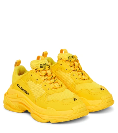 Shop Balenciaga Triple S Sneakers In Yellow
