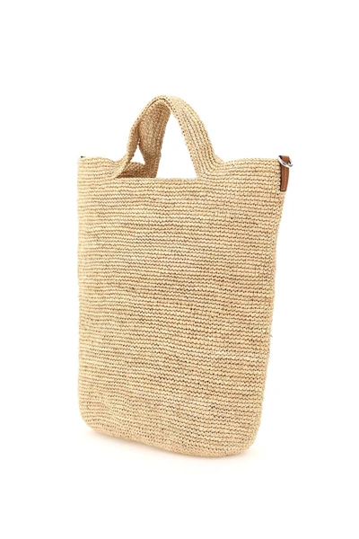 Shop Loewe Handwoven Raffia Slit Bag In Beige,brown