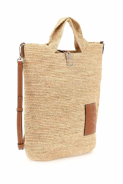 Shop Loewe Handwoven Raffia Slit Bag In Beige,brown