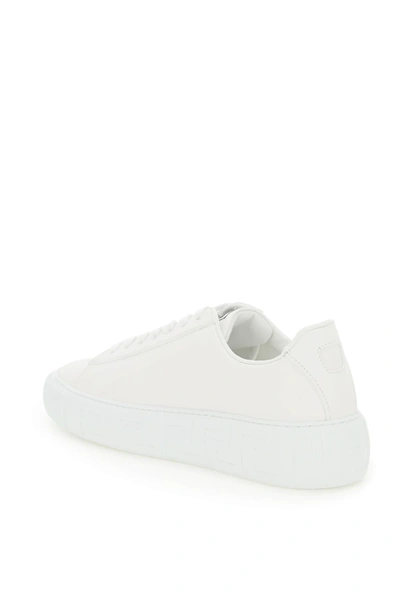 Shop Versace Leather Greca Sneakers In White,black