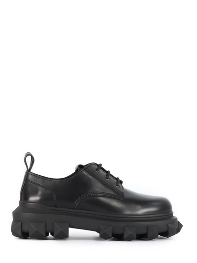 Shop Valentino Calfskin Derby Trackstud In Black