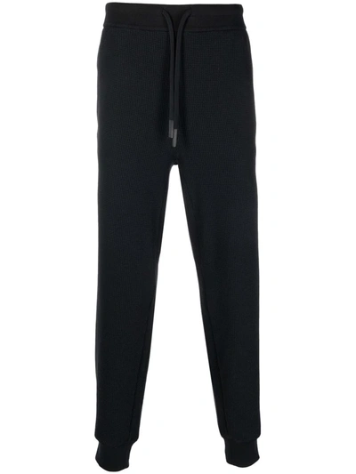 Shop Theory Waffle-knit Cotton Track Trousers In Black