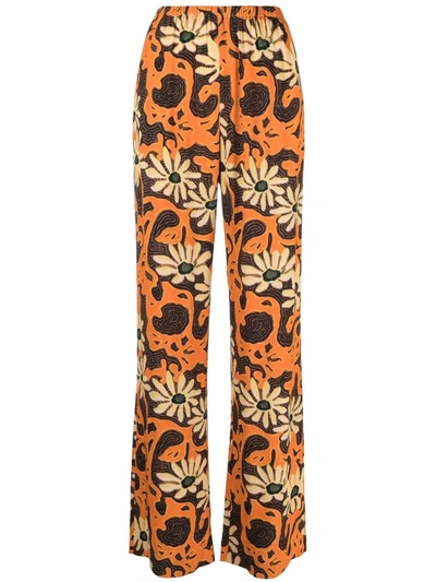 Shop Nanushka Floral Wide-leg Trousers In Arte Povera Floral Orange