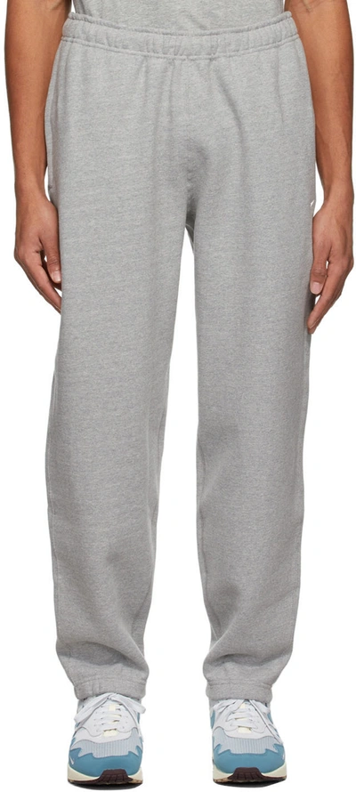 Shop Nike Grey Solo Swoosh Heavyweight Lounge Pants In Dk Grey Heather/whit