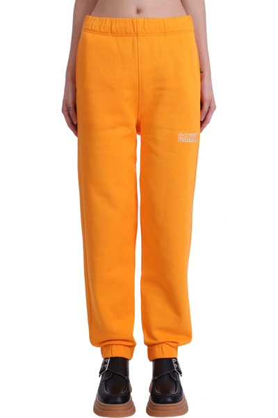 Shop Ganni Pants In Orange Cotton
