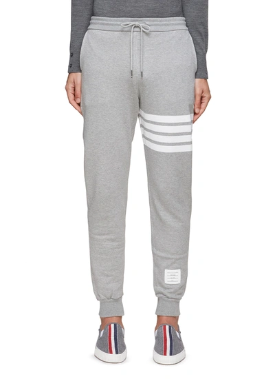Shop Thom Browne Four Bar Stripe Branded Patch Sweatpants In Grey
