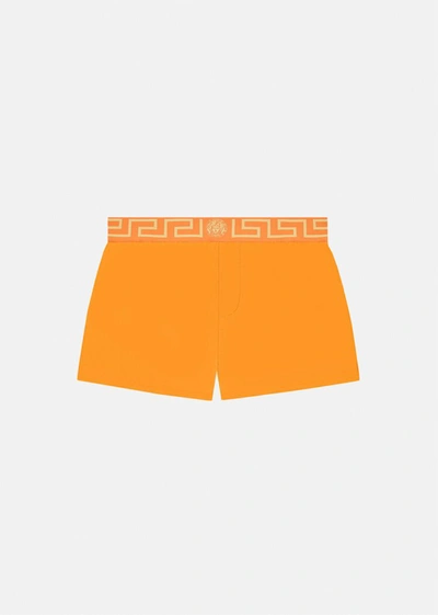 Shop Versace Greca Border Swim Shorts In Orange