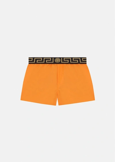 Shop Versace Greca Border Short Swim Shorts In Orange