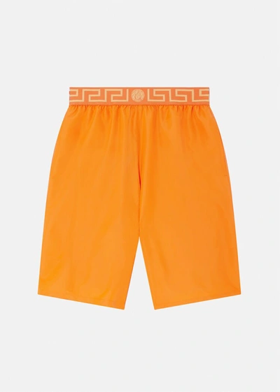 Shop Versace Greca Border Boardshorts In Orange