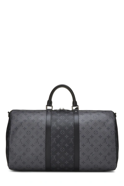 A LIMITED EDITION ECLIPSE SPLIT MONOGRAM CANVAS KEEPALL BANDOULIÈRE 50 WITH  SILVER HARDWARE, LOUIS VUITTON, 2018