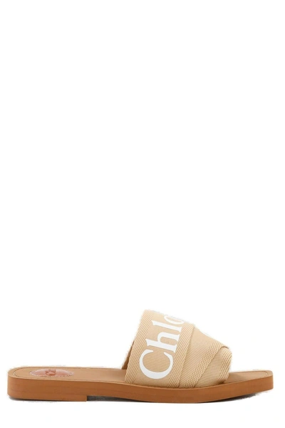 Shop Chloé Woody Flat Mules In Beige