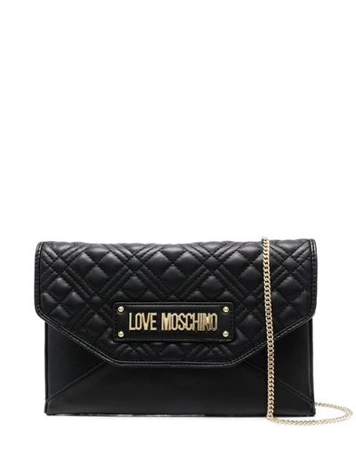 Shop Love Moschino Logo-plaque Quilted Crossbody Bag In Schwarz