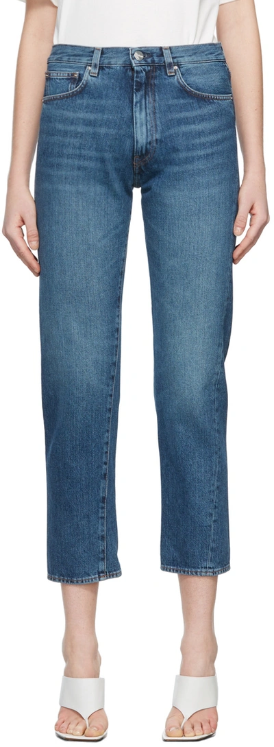 Shop Totême Twisted Seam Jeans In 405 Washed Blue