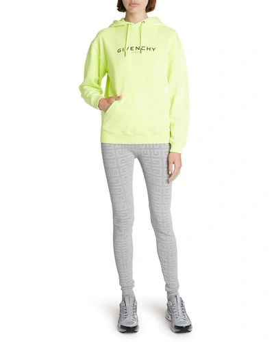 Shop Givenchy Logo Reverse Dye Hoodie In Fluo Yellow