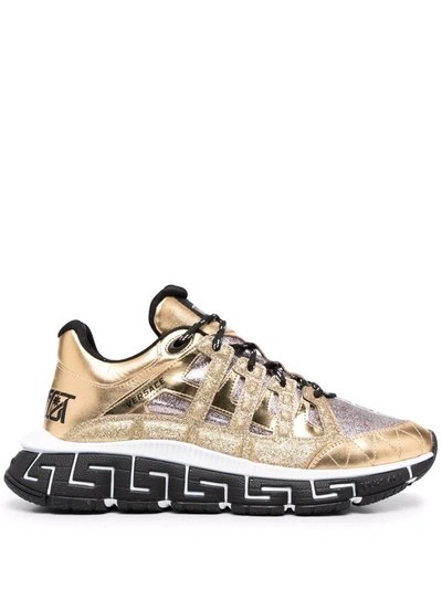 Shop Versace Trigreca Panelled Cut-out Sneakers In Gold
