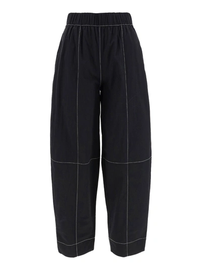 Shop Ganni Stitched Detailed Straight Leg Trousers In Black