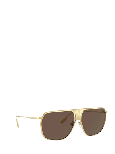 Shop Burberry Sunglasses In Gold