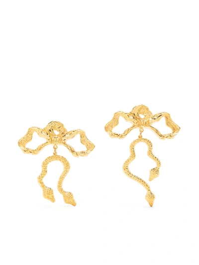 Shop Natia X Lako Long Bow Brass Earrings In Gold