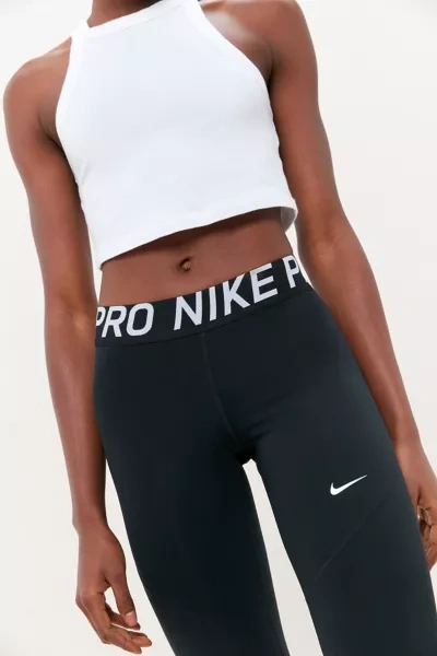 Shop Nike Pro Mid-rise Legging In Black