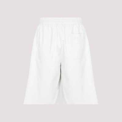 Shop Prada Leather Shorts In White