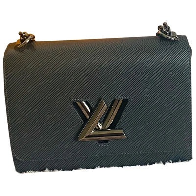 Louis Vuitton® Twist MM Grey. Size