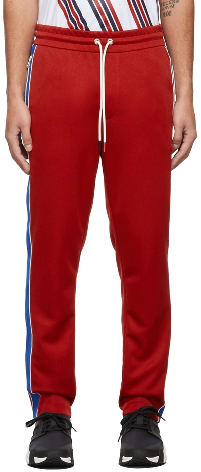 Shop Moncler Red Striped Sweatpants In 480 Red