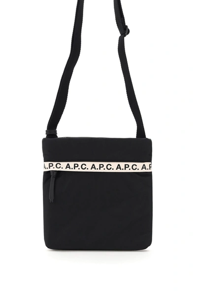 Shop A.p.c. Sacoche Repeat Logo Bag In Noir (black)