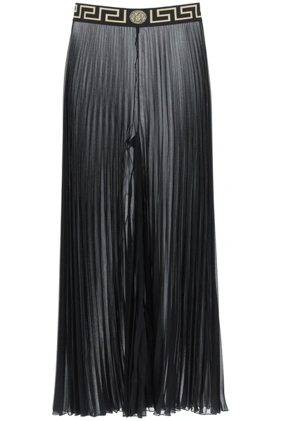 Shop Versace Pleated Pareo Trousers In Nero (black)