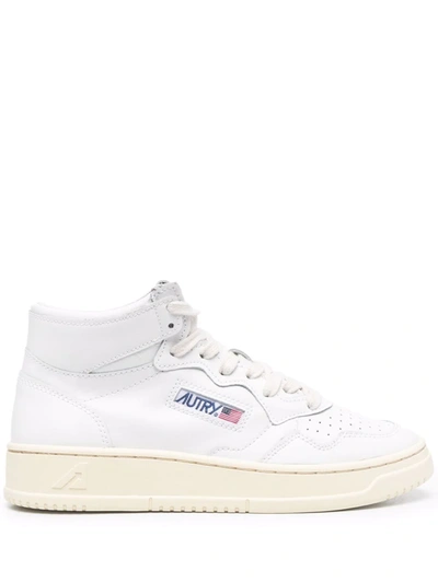 Shop Autry Lace-up Mid-top Sneakers In White