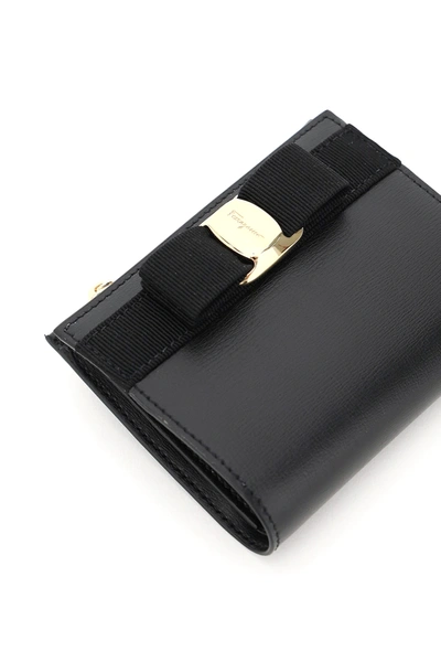 Shop Ferragamo Vara Bow Compact Wallet In Black