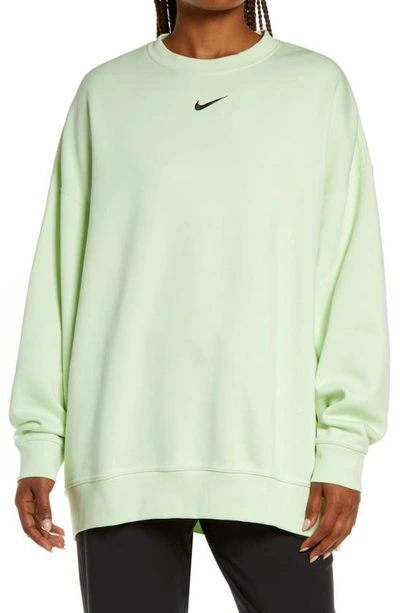 Shop Nike Sportswear Collection Essentials Oversize Fleece Crew Sweatshirt In Lime Ice/ Black