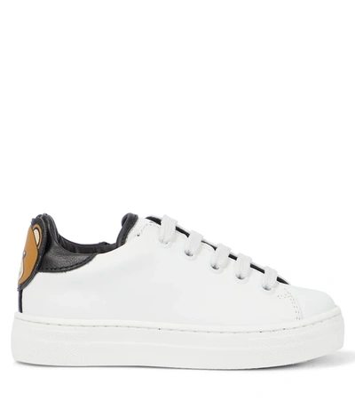 Shop Moschino Leather Sneakers In White