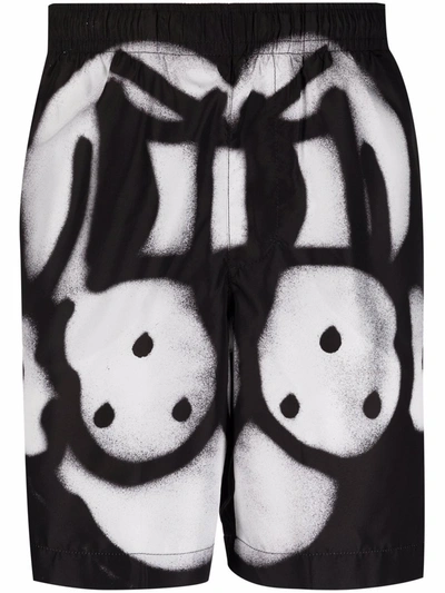 Shop Givenchy Spray-paint Effect Print Shorts In Black