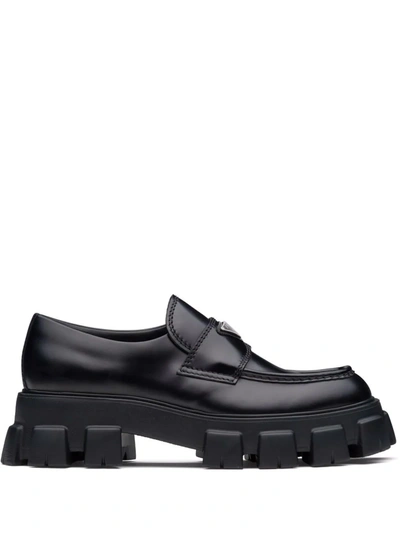 Shop Prada Monolith Brushed Leather Loafers In Black