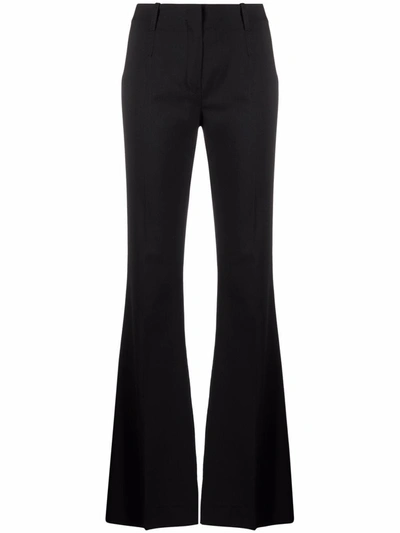 Shop Jacquemus Pinu Trousers In Black