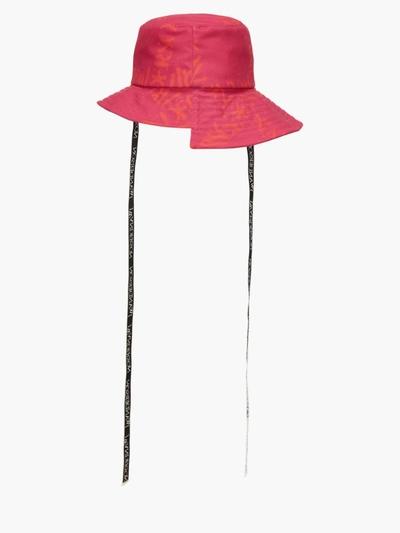 Shop Jw Anderson Asymmetric Bucket Hat In Red