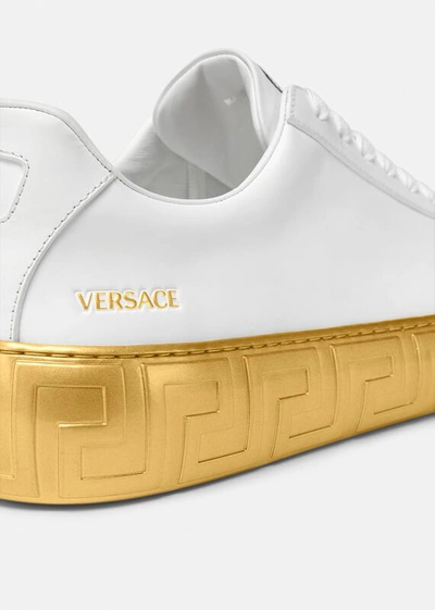 Shop Versace Greca Sneakers In White+print