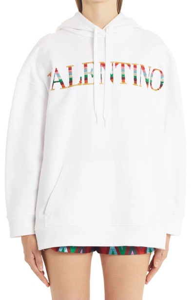 Shop Valentino Sequin Logo Oversize Cotton Hoodie In Bianco 0bo