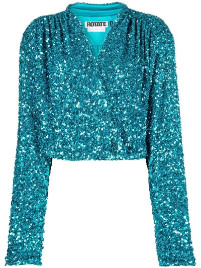 Rotate Birger Christensen Aurelia Cropped Sequined Stretch-jersey Wrap Top In Blau