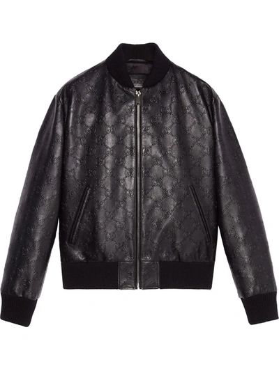 Shop Gucci Gg-debossed Leather Jacket In Schwarz
