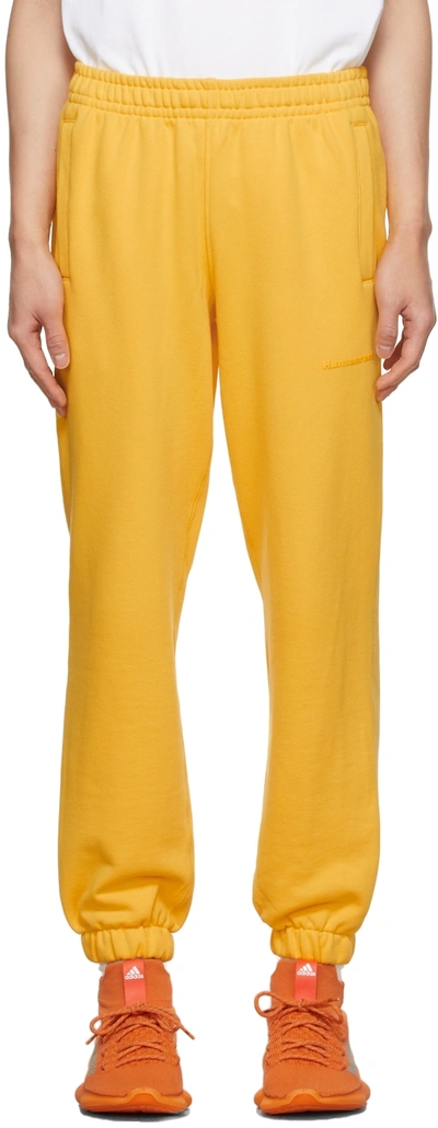 Shop Adidas X Humanrace By Pharrell Williams Ssense Exclusive Yellow Humanrace Basics Lounge Pants In Bold Gold 005a