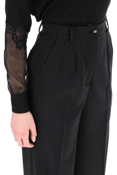 Shop Dolce & Gabbana Wool Palazzo Trousers In Black