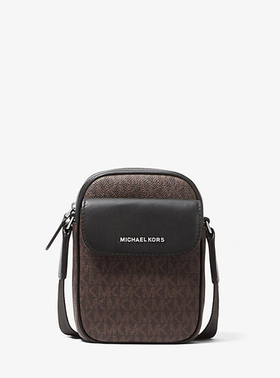 Shop Michael Kors Hudson Logo Smartphone Crossbody Bag In Brown