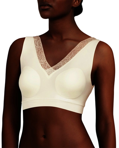 Shop Chantelle Softstretch Lace-trim Padded Bra Top In Ivory