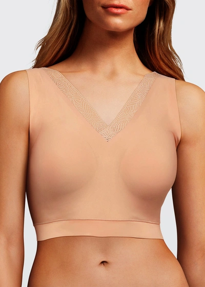 Shop Chantelle Softstretch Lace-trim Padded Bra Top In Nude Blush