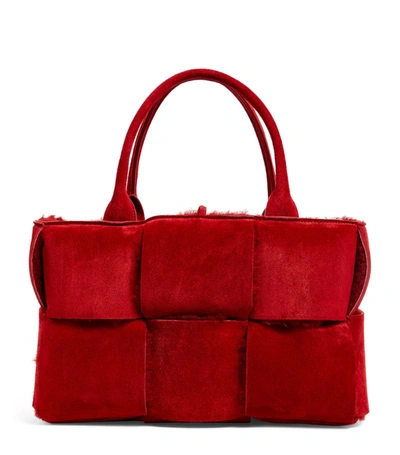 Shop Bottega Veneta Small Shearling Intreccio Arco Tote Bag In Red