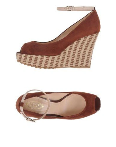 Shop Tod's Pumps In Cocoa