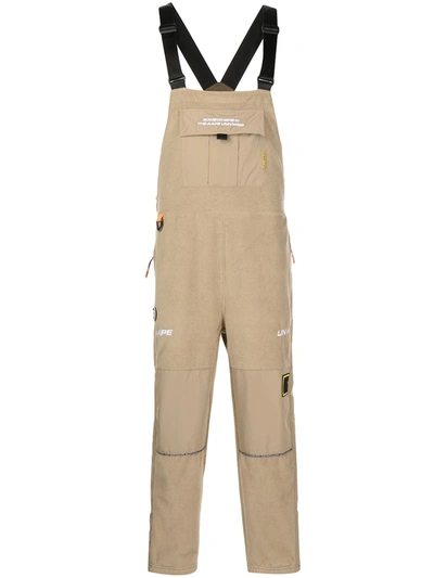 Shop Aape By A Bathing Ape Logo-print Tapered Jumpsuit In Brown